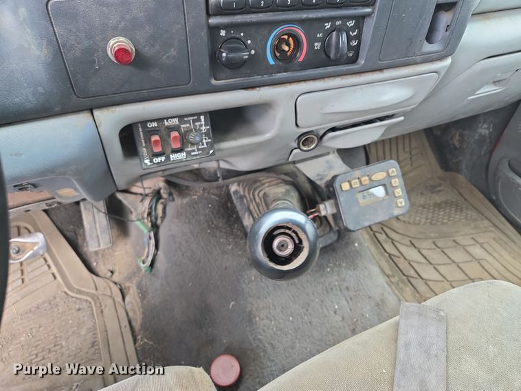 image for item EQ6903 1999 Ford  F550 Super Duty  rollback truck