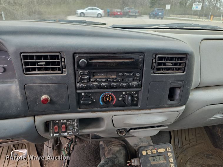 image for item EQ6903 1999 Ford  F550 Super Duty  rollback truck