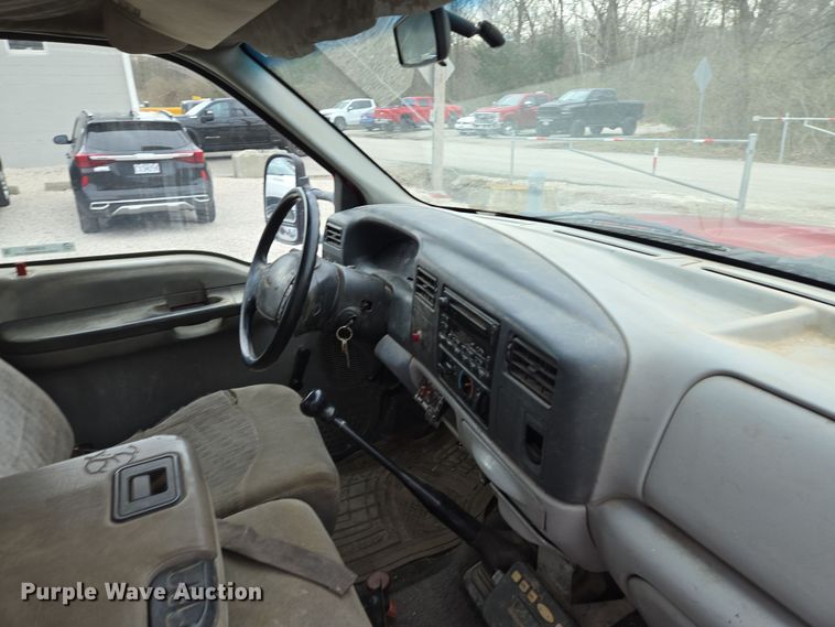 image for item EQ6903 1999 Ford  F550 Super Duty  rollback truck