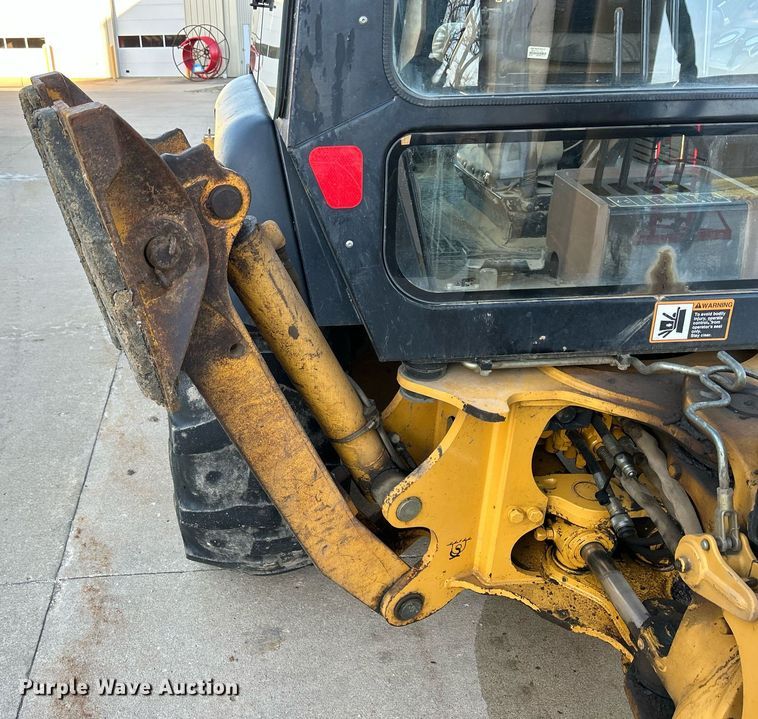 image for item ND9393 2000 John Deere 310SE backhoe