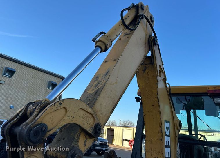 image for item ND9393 2000 John Deere 310SE backhoe