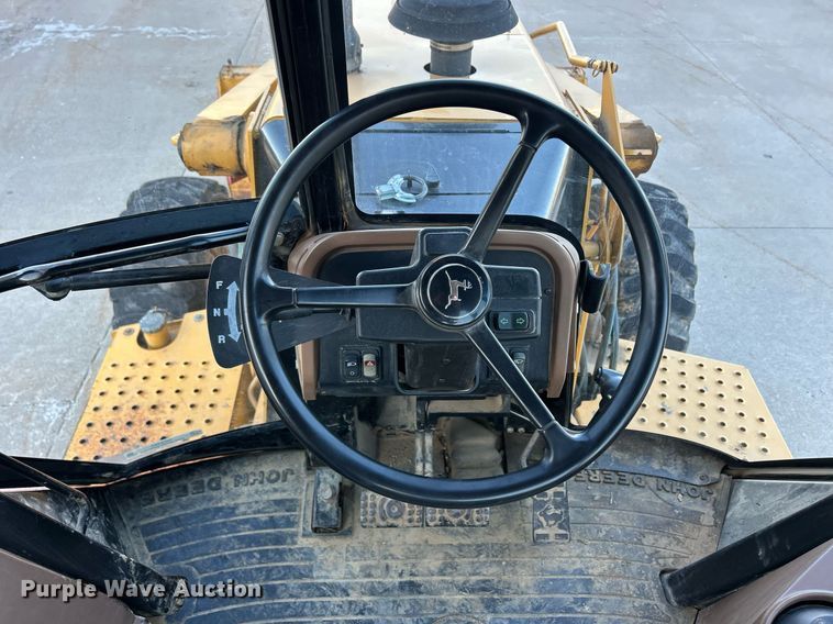 image for item ND9393 2000 John Deere 310SE backhoe