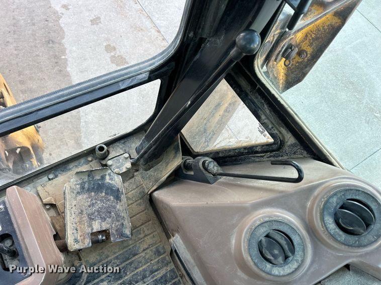 image for item ND9393 2000 John Deere 310SE backhoe