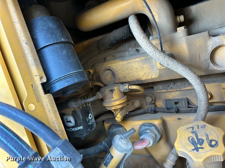 image for item ND9393 2000 John Deere 310SE backhoe