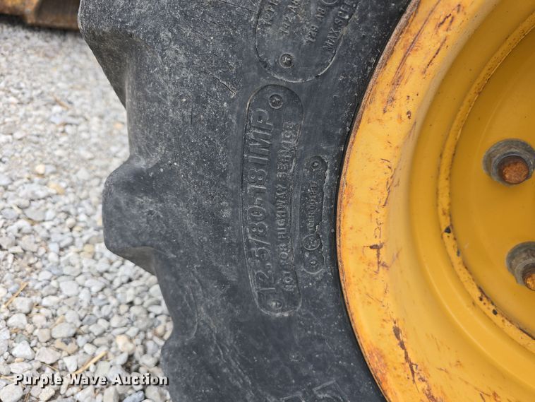 image for item DT6764 2010 John Deere 410J backhoe