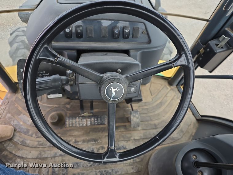 image for item DT6764 2010 John Deere 410J backhoe