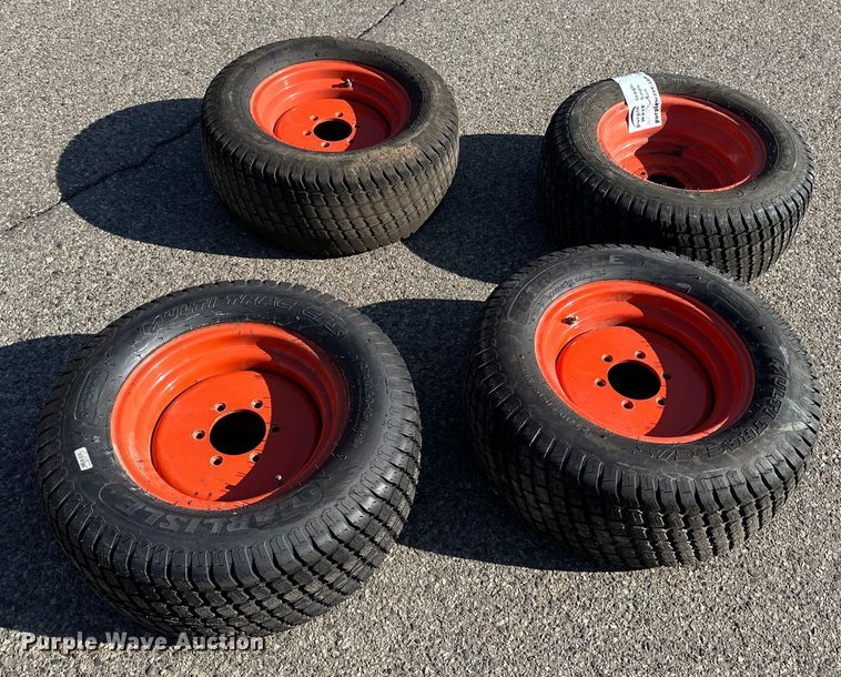 image for item DV0684 (4) 27x10.5-15 tires and wheels