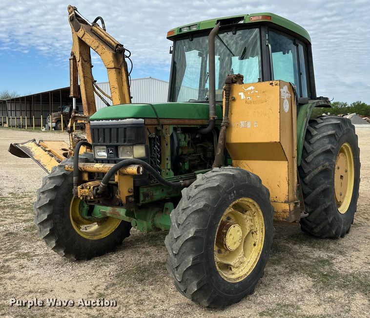 image for item DW8636 1997 John Deere 6400 MFWD tractor