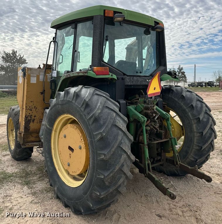 image for item DW8636 1997 John Deere 6400 MFWD tractor