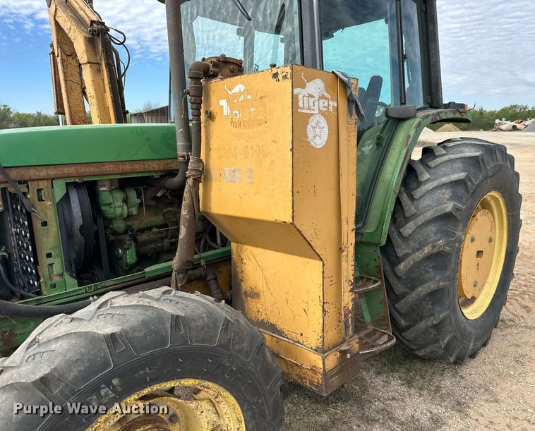 image for item DW8636 1997 John Deere 6400 MFWD tractor