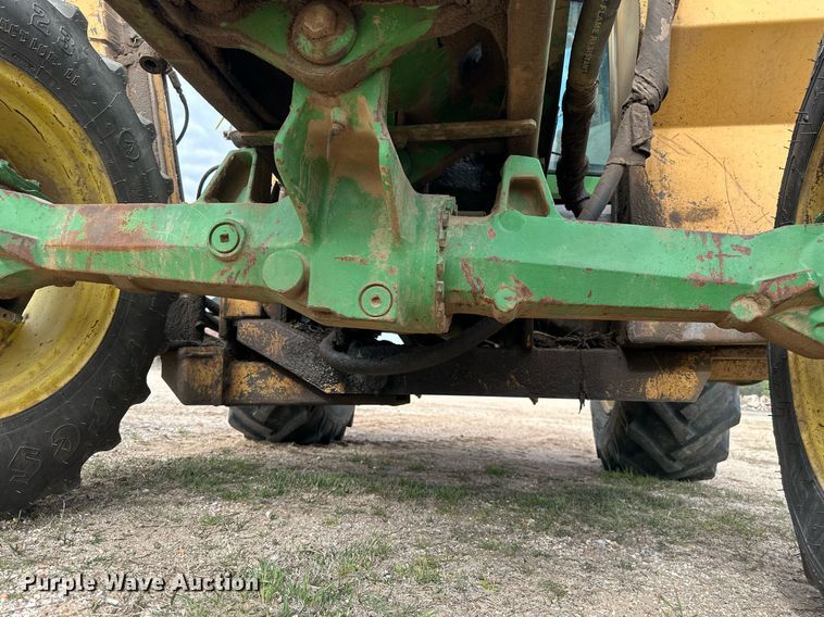 image for item DW8636 1997 John Deere 6400 MFWD tractor