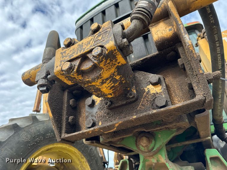 image for item DW8636 1997 John Deere 6400 MFWD tractor