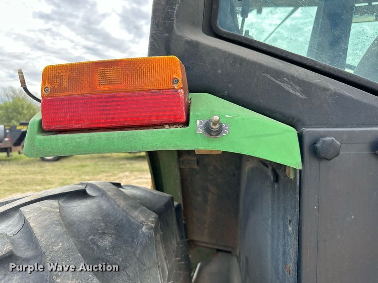 image for item DW8636 1997 John Deere 6400 MFWD tractor