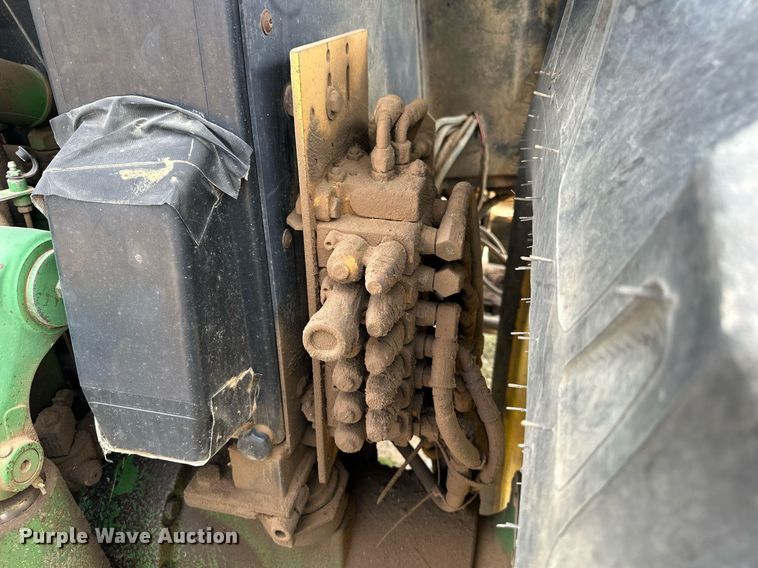 image for item DW8636 1997 John Deere 6400 MFWD tractor