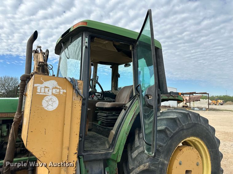 image for item DW8636 1997 John Deere 6400 MFWD tractor