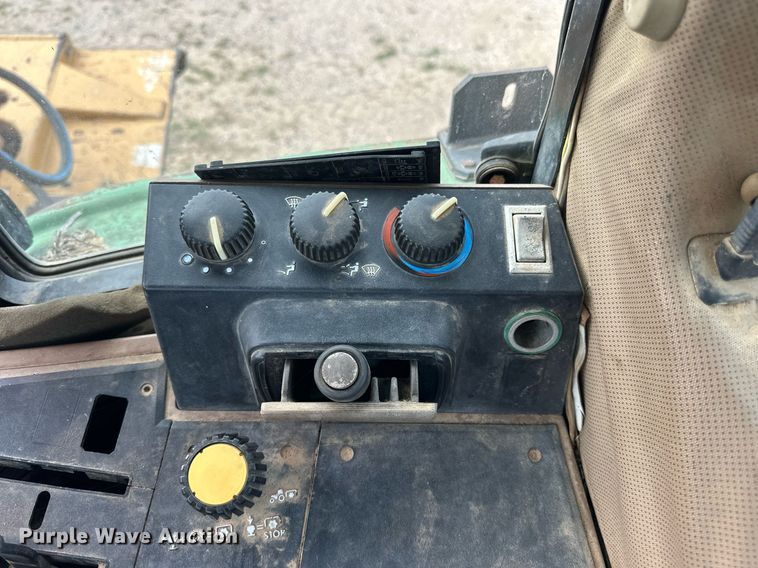 image for item DW8636 1997 John Deere 6400 MFWD tractor