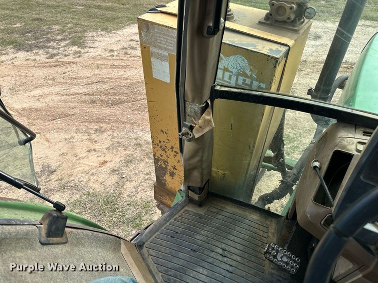 image for item DW8636 1997 John Deere 6400 MFWD tractor