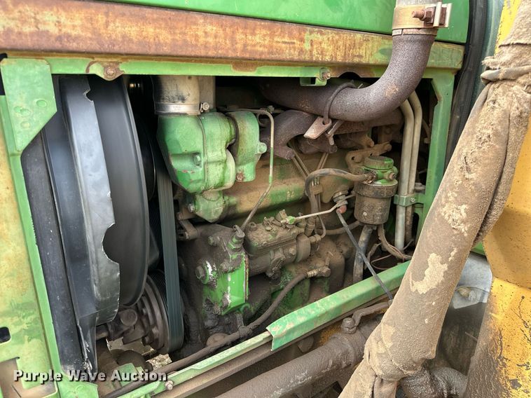 image for item DW8636 1997 John Deere 6400 MFWD tractor