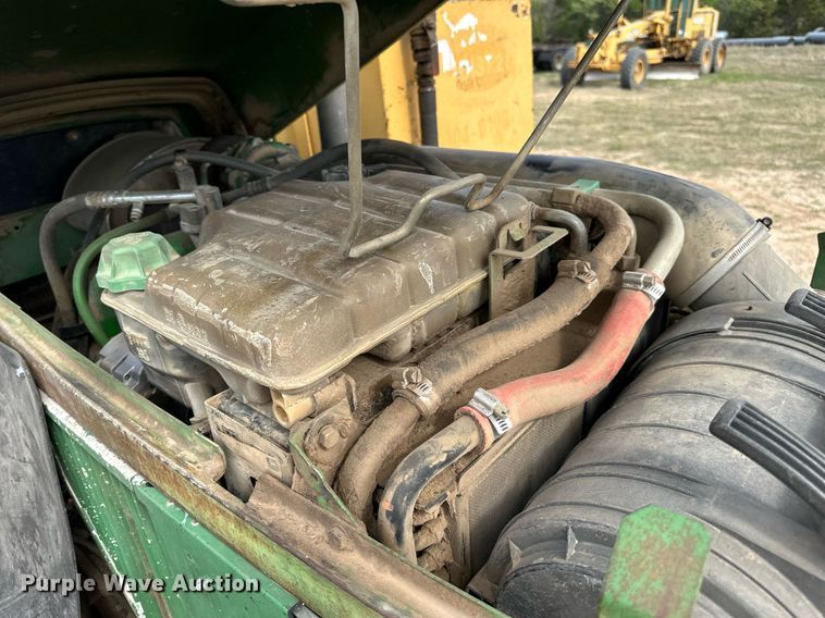 image for item DW8636 1997 John Deere 6400 MFWD tractor