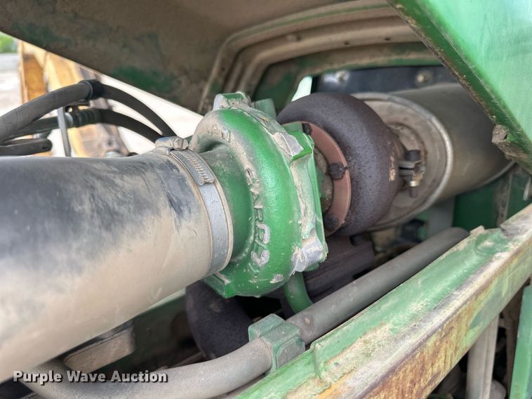 image for item DW8636 1997 John Deere 6400 MFWD tractor