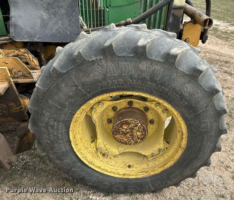 image for item DW8636 1997 John Deere 6400 MFWD tractor