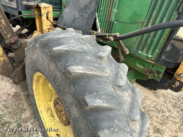 image for item DW8636 1997 John Deere 6400 MFWD tractor
