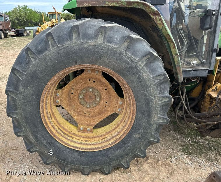 image for item DW8636 1997 John Deere 6400 MFWD tractor