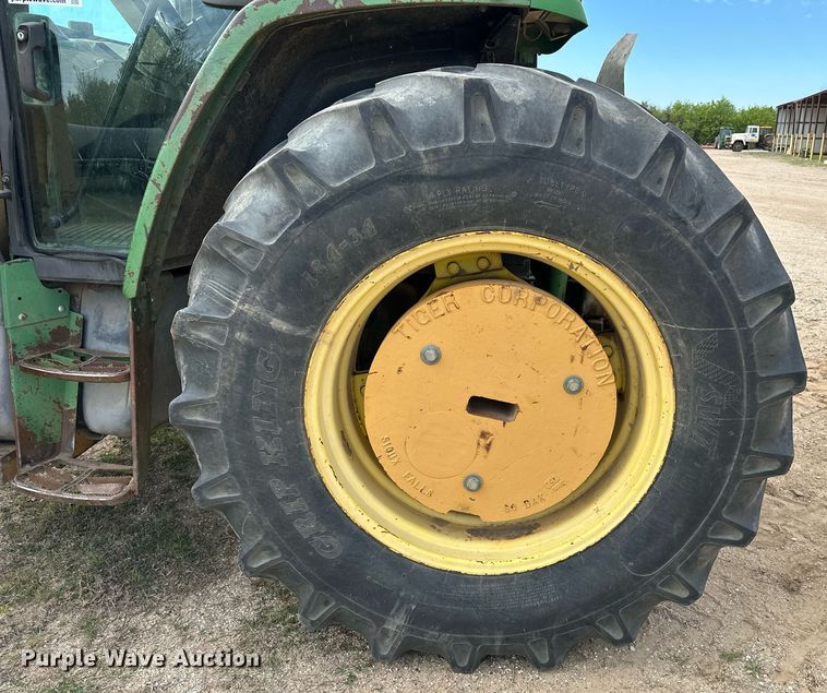 image for item DW8636 1997 John Deere 6400 MFWD tractor
