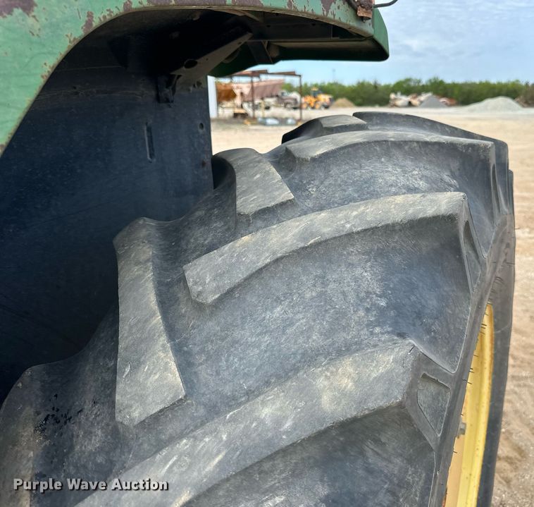 image for item DW8636 1997 John Deere 6400 MFWD tractor