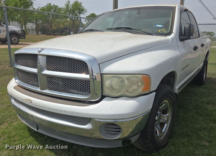 image for item DW8666 2002 Dodge Ram 1500 Quad Cab pickup truck