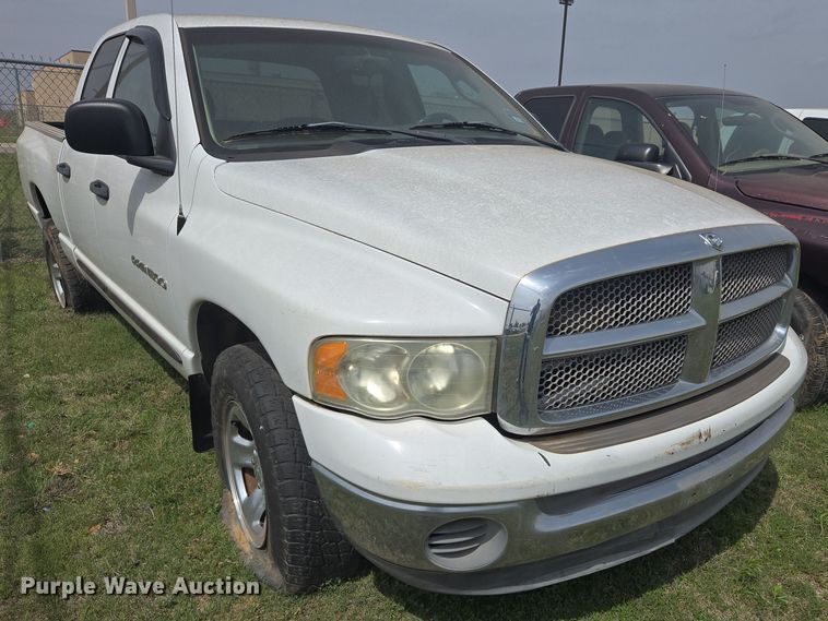 image for item DW8666 2002 Dodge Ram 1500 Quad Cab pickup truck