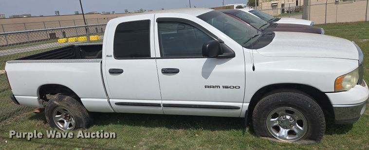 image for item DW8666 2002 Dodge Ram 1500 Quad Cab pickup truck