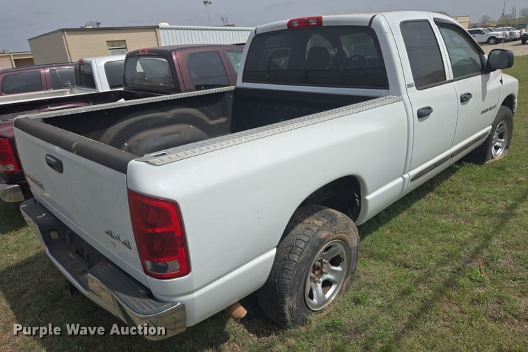 image for item DW8666 2002 Dodge Ram 1500 Quad Cab pickup truck