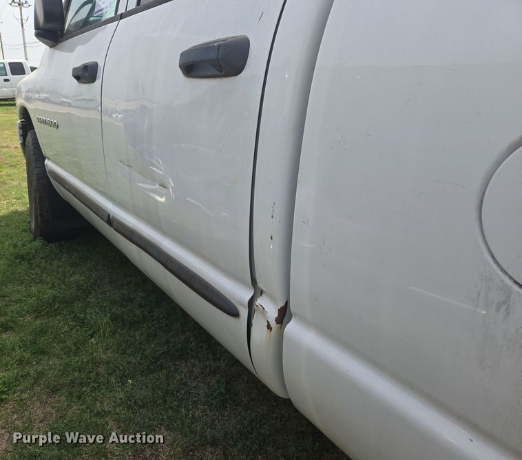 image for item DW8666 2002 Dodge Ram 1500 Quad Cab pickup truck