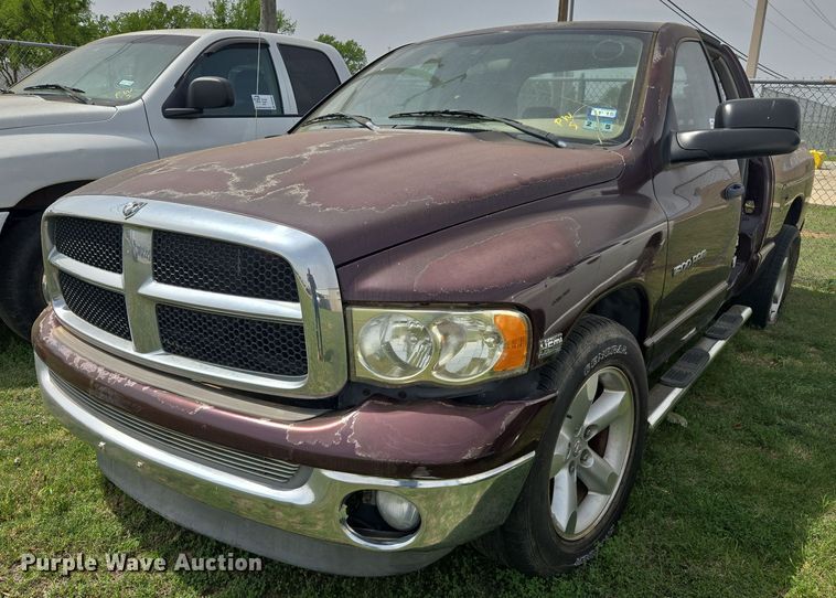 image for item DW8667 2004 Dodge Ram 1500 Quad Cab pickup truck