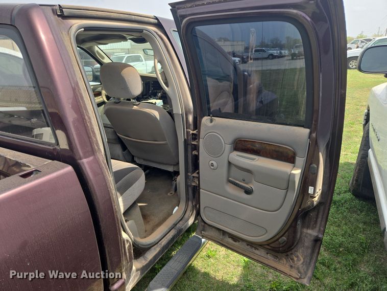 image for item DW8667 2004 Dodge Ram 1500 Quad Cab pickup truck