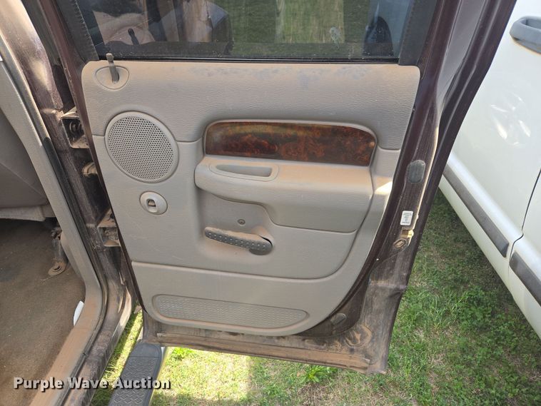 image for item DW8667 2004 Dodge Ram 1500 Quad Cab pickup truck