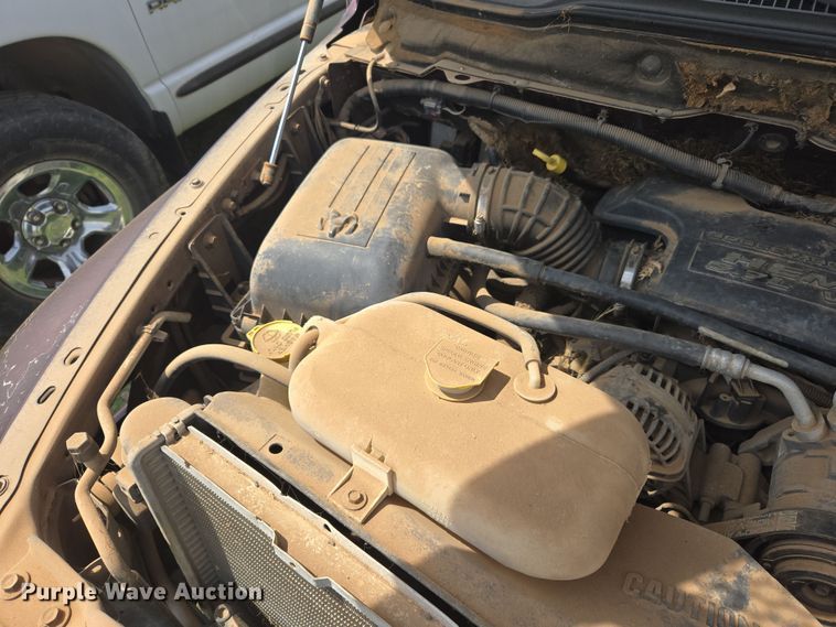 image for item DW8667 2004 Dodge Ram 1500 Quad Cab pickup truck