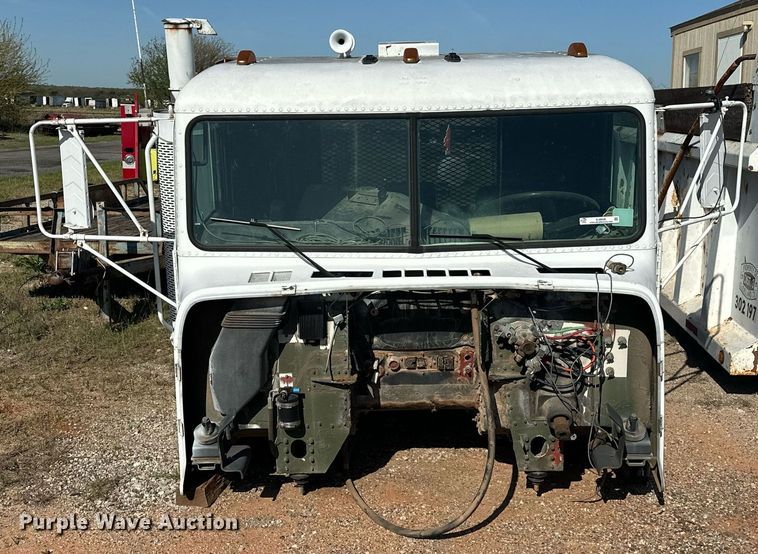 image for item EJ8608 1991 Freightliner M915A2 semi truck cab