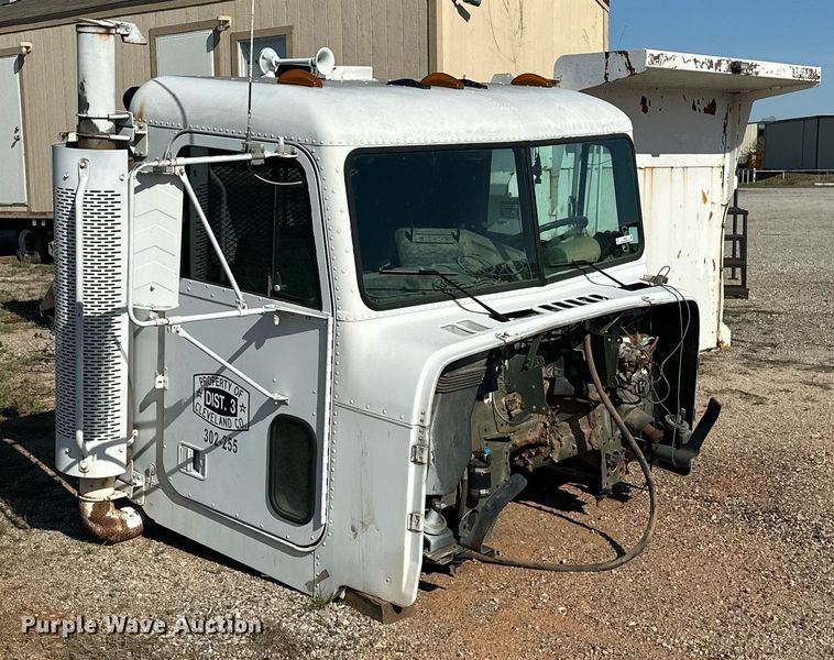 image for item EJ8608 1991 Freightliner M915A2 semi truck cab