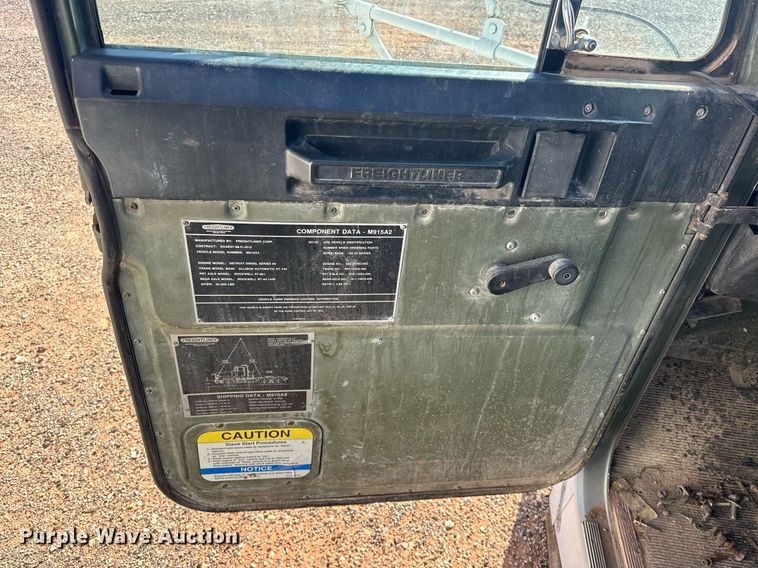 image for item EJ8608 1991 Freightliner M915A2 semi truck cab