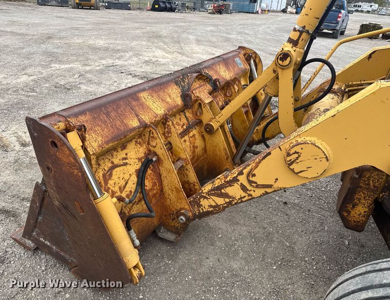 image for item EQ1252 1996 John Deere 310D backhoe