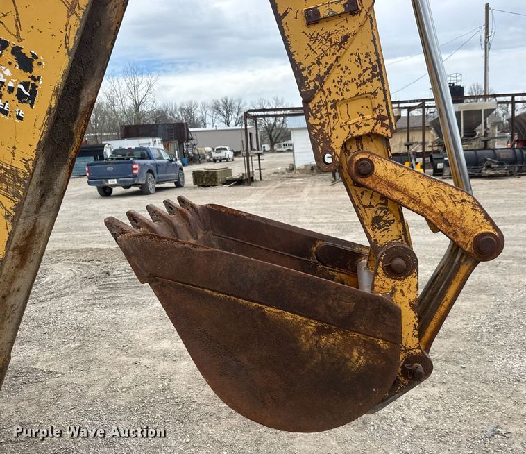 image for item EQ1252 1996 John Deere 310D backhoe