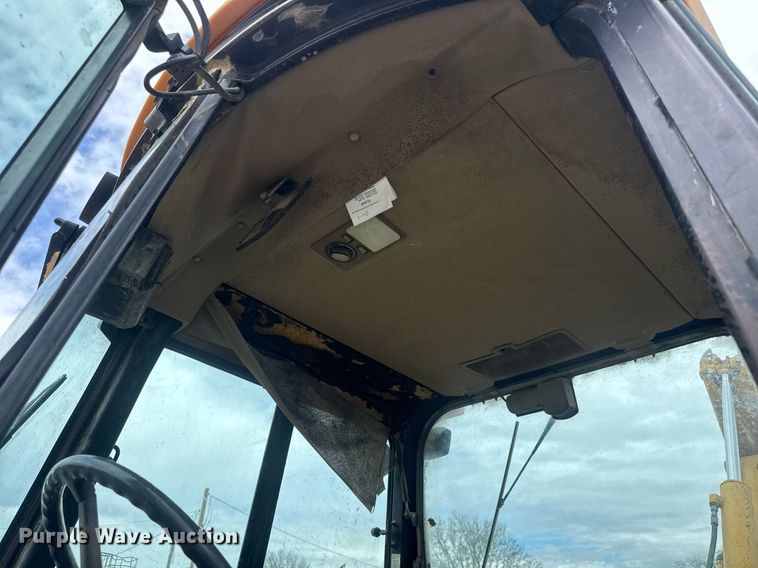 image for item EQ1252 1996 John Deere 310D backhoe