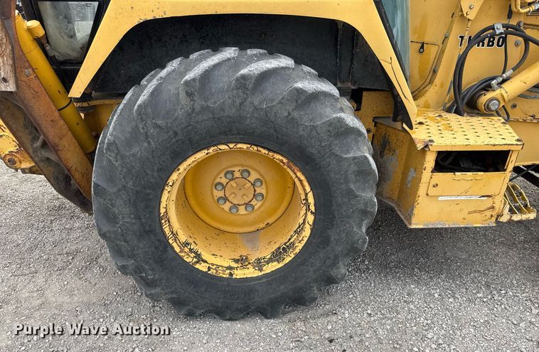 image for item EQ1252 1996 John Deere 310D backhoe