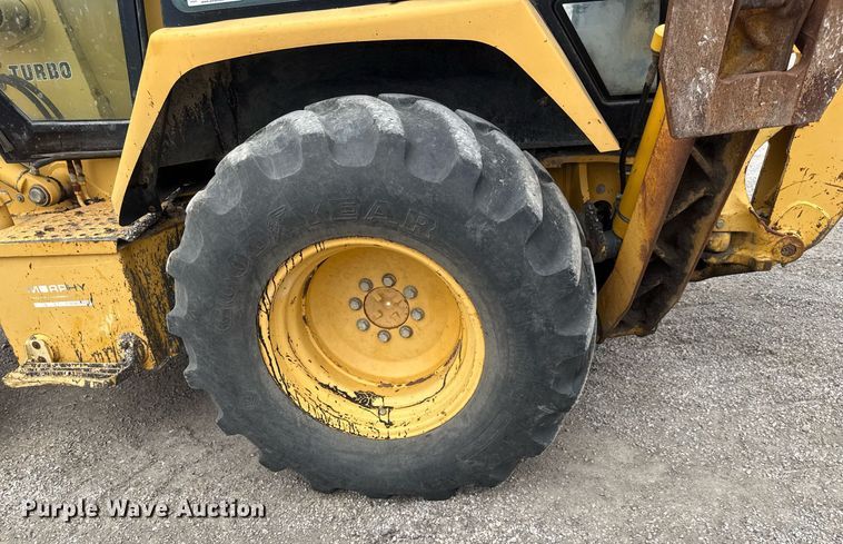 image for item EQ1252 1996 John Deere 310D backhoe