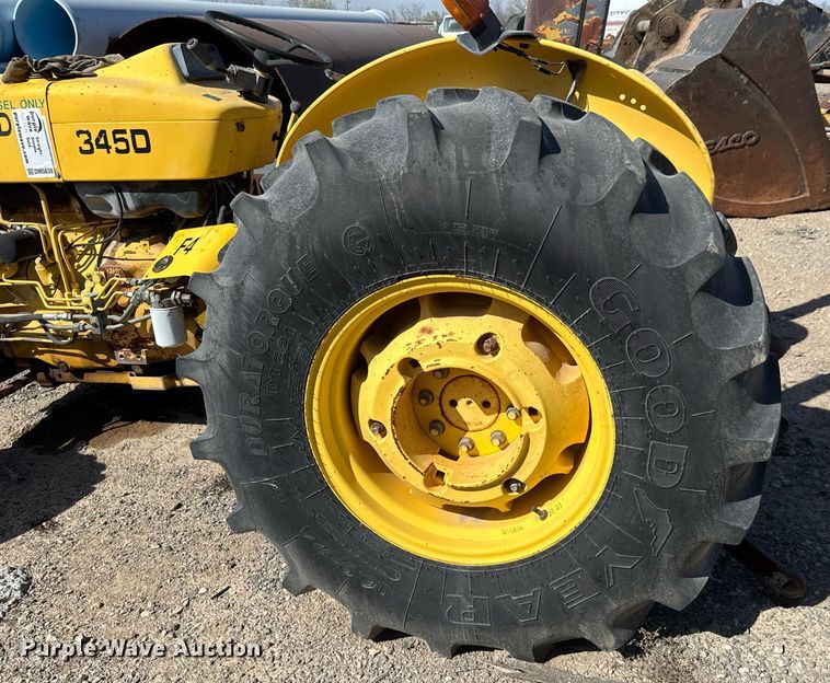 image for item DM5638 New Holland 345D MFWD tractor