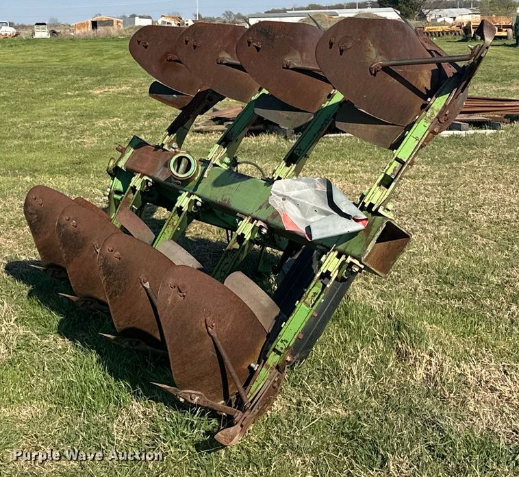 image for item EJ8369 John Deere E-8350 eight bottom two-way plow