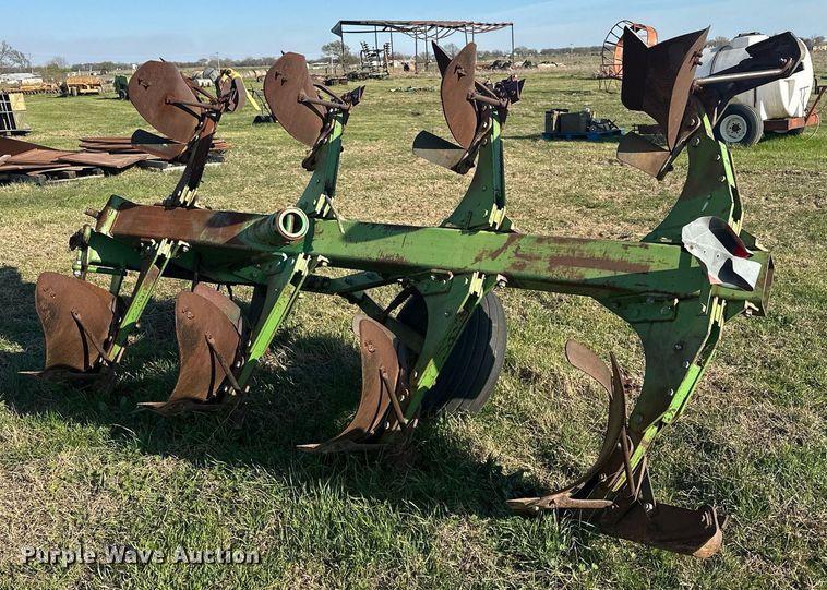 image for item EJ8369 John Deere E-8350 eight bottom two-way plow