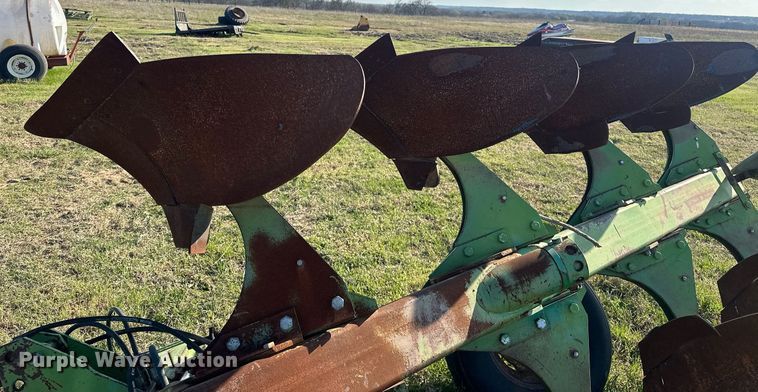 image for item EJ8369 John Deere E-8350 eight bottom two-way plow